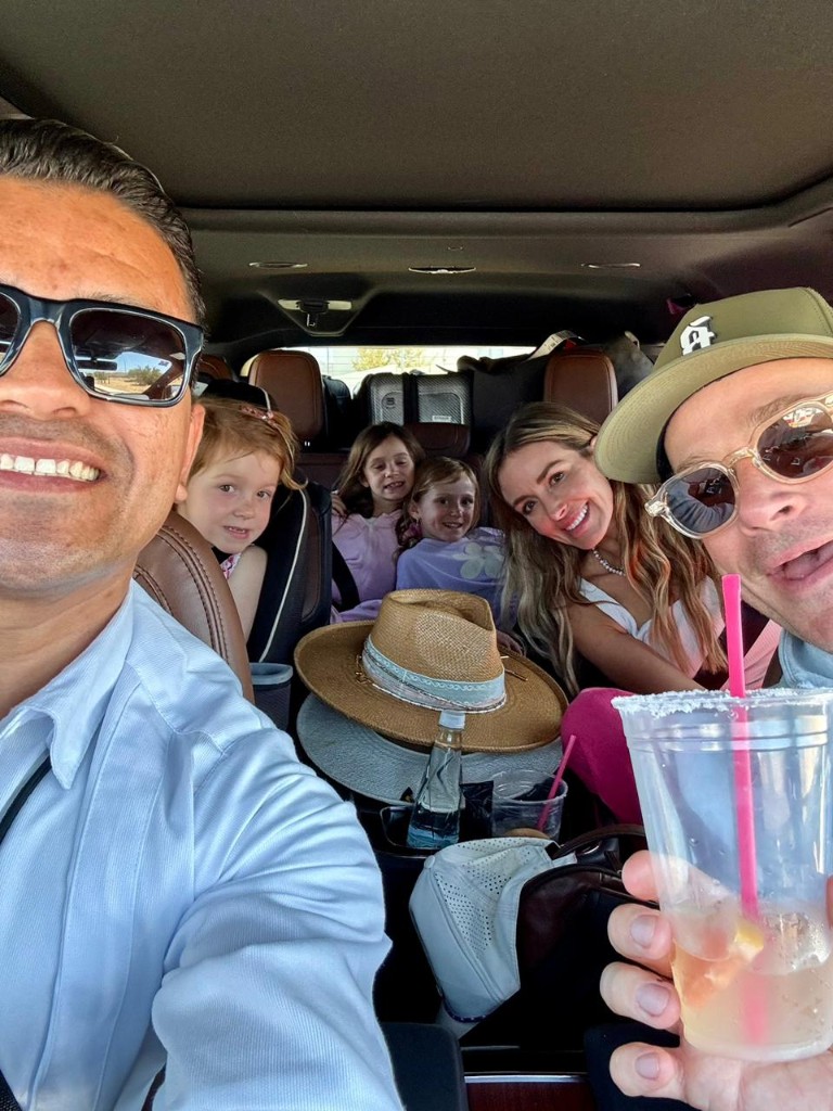 Family of five enjoying a private Cabo airport shuttle from SJD to their resort