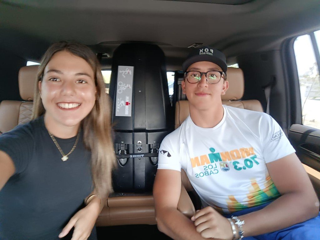 Travelers with Ironman gear loaded into a private SJD to La Paz transportation van