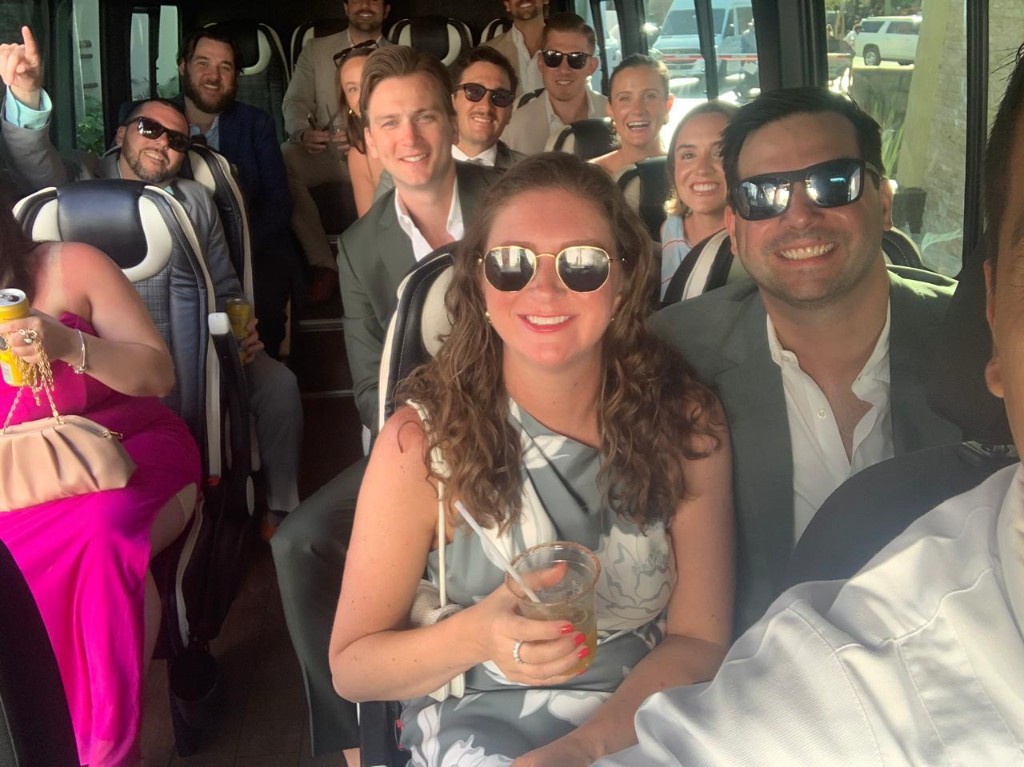 Wedding guests stepping off a Toyota Hiace Cabo hotel shuttle at a Los Cabos resort